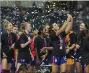  ?? FERNANDO LLANO — THE ASSOCIATED PRESS ?? U.S. national team veteran Alex Morgan takes a selfie after winning the CONCACAF Women’s Championsh­ip on July 18.