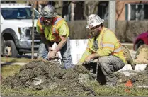  ?? AP 2024 ?? Constructi­on workers work in Mount Prospect, Ill. Friday’s report from the Labor Department showed that the jobless rate dipped from 3.9% to 3.8%. It’s been below 4% for 26 months straight.