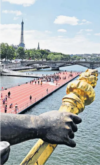  ?? ?? g Straight and narrow: a floating athletics track on the Seine, used in the campaign to host the Games
h Big draw: an illustrati­on for the 1900 Olympics, held in Paris as part of the Great Exposition
j Future gazing: an artist’s impression of the opening ceremony due to take place on July 26