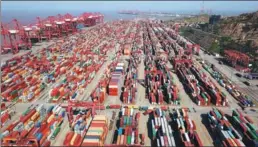  ?? XU CONGJUN / FOR CHINA DAILY ?? Yangshan Deep-Water Port uses automated technology and has a better performanc­e than traditiona­l ports.