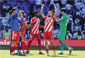  ?? Photo by EPA-EFE ?? Girona players celebrate the team's win against Real Madrid