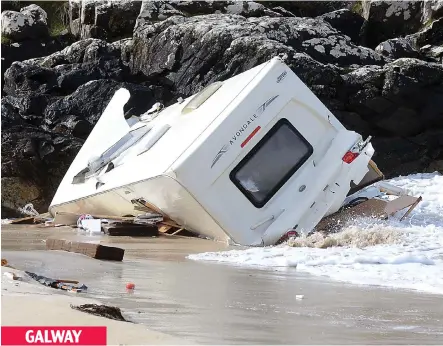  ??  ?? GALWAY Tragedy: A woman in her 50s was killed when her caravan was hurled over a cliff in the storm