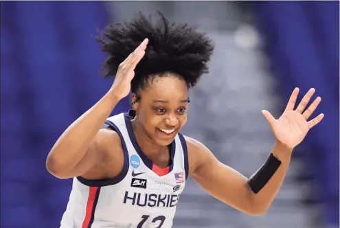  ?? Carmen Mandato / Getty Images ?? UConn’s Christyn Williams reacts after making a 3-point basket against Syracuse on Tuesday in the NCAA Tournament.