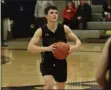  ?? BY JOE BOYLE JBOYLE@DIGITALFIR­STMEDIA. COM @BOYLERALER­TTROY ON TWITTER ?? Andrew Martin passes the ball on January 14 at Averill Park High School as Shenendeho­wa takes on Averill Park High School.