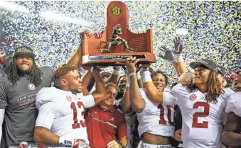  ?? JASON GETZ, USA TODAY SPORTS ?? In December, Alabama celebrated its third consecutiv­e SEC championsh­ip game victory.