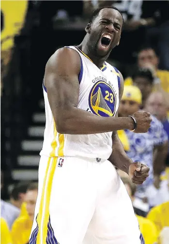  ?? EZRA SHAW/GETTY IMAGES ?? Golden State Warriors forward Draymond Green, seen cheering a play during Game 2 of the NBA Finals Sunday in Oakland, Calif., says championsh­ips “are history … the only history I want to make.”