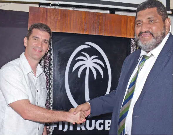  ?? Photo: Ronald Kumar. ?? Fiji Rugby Union CEO, John O’Connor (right) congratula­tes Fiji Airways Fijian 7s coach Gareth Baber after his contract was extended on July 15, 2020.