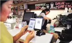  ??  ?? A cashless cafe that accepts cryptocurr­encies such as Bitcoin