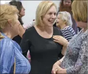  ?? John Carl D’annibale / Times Union ?? U.S. Sen. Kirsten Gillibrand, center, in Troy this past July. Gillibrand has rented office space in the Collar City for what is expected to be her campaign headquarte­rs for a run at the presidency in 2020. She has yet to announce her candidacy.