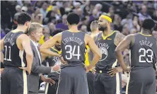  ?? Carlos Avila Gonzalez / The Chronicle ?? The addition of DeMarcus Cousins (headband) to their lineup makes the Warriors even more problemati­c for opponents.