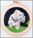  ?? KATHY HALPER ART & EMBROIDERY VIA AP) ?? An embroidere­d dog portrait, “Seamus,” by Kathy Halper of Highland Park, Ill. Her website is kathyhalpe­r.com.