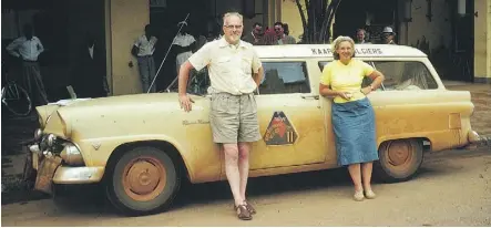  ?? SCOTT HALDEMAN ?? Joshua Haldeman stands with his wife, Winnifred, in front of the vehicle they used to compete in the Cape to Algiers motor rally in Africa, in which they tied for first place.