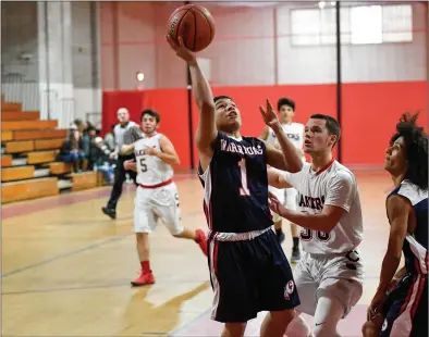  ?? File photo by Jerry Silberman / risportsph­oto.com ?? Central Falls guard Marcos Negron (1), seen here earlier in the season against Coventry, scored a game-high 15 points to lead the Warriors to 54-41 Division III crossover victory over Mount St. Charles Wednesday night.