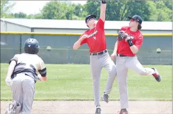  ?? RICK PECK/SPECIAL TO MCDONALD COUNTY PRESS ?? Brothers Cross (left) and Destyn Dowd nearly collide while covering second base to complete a double play during the McDonald County 16U baseball team’s 5-3 win over Neosho on May 30 in the Carl Junction 16U Tournament.