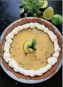  ?? GRETCHEN MCKAY/PITTSBURGH POST-GAZETTE/TNS ?? Cool and creamy, lime pie studded with bits of basil hits the spot on a hot summer night.