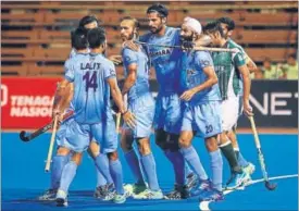  ??  ?? The Indian hockey team celebrates after scoring a goal against Pakistan. HOCKEY INDIA PHOTO