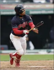  ?? TONY DEJAK — THE ASSOCIATED PRESS ?? The Indians’ Francisco Lindor watches his solo home run off the Royals’ Kevin McCarthy during the seventh inning.