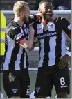  ??  ?? PARFECT: Nat Wedderburn (No 8) celebrates his winner