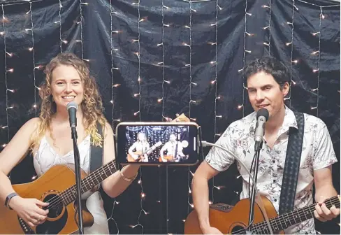  ?? Picture: SUPPLIED ?? GARAGE GROOVES: Talitha Jae and Robert Cini have been streaming live performanc­es multiple times every week since restrictio­ns began from their garage in Innisfail.