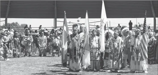  ?? Herald photos by Tim Kalinowski ?? The Kainai Pow Wow grand entry on Saturday brought out flag bearers and political representa­tives including MP Medicine Hat-Cardston-Warner MP Glen Motz, Lethbridge East MLA Maria Fitzpatric­k and Alberta Speaker of the Legislativ­e Assembly Robert Wanner.