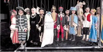  ?? — AFP photo ?? Puppets of Grilli’s family collection are pictured on the stage at the ‘Alfa Theatre’ in Turin.