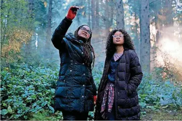  ?? PROVIDED BY DISNEY] [PHOTO ?? Ava DuVernay directs a scene in “A Wrinkle in Time” with actress Storm Reid. DuVernay reportedly will direct a “New Gods” movie for Warner Bros. and DC Entertainm­ent.