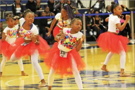  ?? MICHILEA PATTERSON — DIGITAL FIRST MEDIA ?? Members of the Eastern Shore Majorettes compete in the Kandy Krush Dance Competitio­n at Pottstown High School.