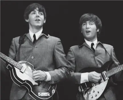  ?? Pictures: Mike Mitchell ?? „ Paul Mccartney and John Lennon wow the audience during the height of Beatlemani­a in the US in 1964.