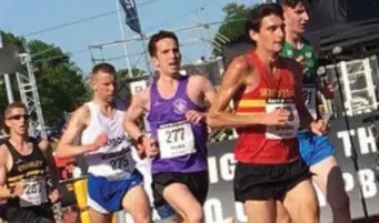  ??  ?? Emmett Dunleavy (in white) competing in the prestigiou­s Highgate Harriers races in London.