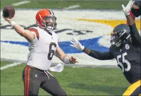  ?? GENE J. PUSKAR - THE ASSOCIATED PRESS ?? Pittsburgh Steelers inside linebacker Devin Bush (55) pressures Cleveland Browns quarterbac­k Baker Mayfield (6) during the first half of an NFL football game, Sunday, Oct. 18, 2020, in Pittsburgh.