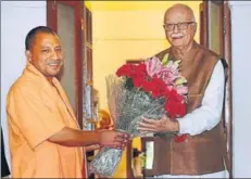  ?? PTI ?? BJP leader LK Advani (R) with Uttar Pradesh chief minister Yogi Adityanath, New Delhi, March 21. Adityanath’s hardliner Hindutva image can help the party polarise voters.