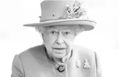  ??  ?? Britain’s Queen Elizabeth II reacts during a visit to the Household Cavalry Mounted Regiment at the Hyde Park Barracks in west London. Millions of pounds from the private estate of Britain’s Queen Elizabeth II have been invested in offshore tax haven...