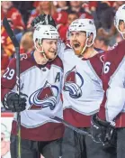  ?? SERGEI BELSKI/USA TODAY SPORTS ?? Colin Wilson, center, celebrates with Avalanche teammates after scoring in their series-clinching win over the Flames.