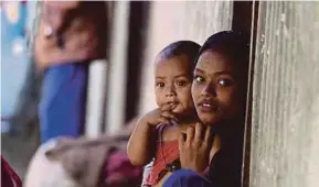  ??  ?? Rohingya refugees at a camp in Teknaf in Bangladesh yesterday.