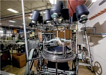  ?? DAVID UNWIN/ STUFF ?? Manawatū Knitting Mills’ antique circular machine is never turned off, partly due to fears it may not start up again.