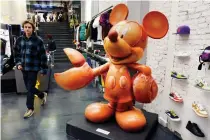  ?? AP PHOTO ?? CREEPY OR CUTE?
The ‘Lobsta Mickey’ statue is displayed in the Concepts sneaker store in Boston, Massachuse­tts on Friday, Nov. 25, 2022.