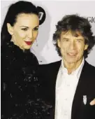  ?? Bild: SN/EPA ?? L’Wren Scott, Mick Jagger.