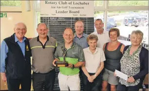  ?? Photo: Alba Phoos ?? Rotary Club of Lochaber president Terry Lee, left, presented the awards at the club’s annual fundraisin­g Am Am golf tournament which was held at Fort William Golf Club last Sunday.