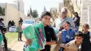  ?? (واس) ?? مستفيدون يتسلمون مساعداتهم بريف حلب