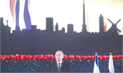  ?? (Marc Israel Sellem/The Jerusalem Post) ?? RUSSIAN PRESIDENT VLADIMIR PUTIN speaks yesterday during the inaugurati­on of the Memorial Candle monument in Jerusalem’s Sacher Park to the defenders of Leningrad during its 900-day siege by the Nazis.