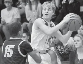  ?? Photo by Loni Mendez ?? Snyder’s Jacob James defends Sweetwater’s Jadyn Forbes who looks to pass the ball in the boys game.