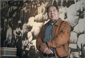  ?? DAMIAN DOVARGANES — THE ASSOCIATED PRESS ?? Ron Wakabayash­i pauses for a picture at the Japanese American National Museum in Los Angeles, Feb. 11. “Probably the more important thing that we got out of that was the generation­al healing, and the restoratio­n of our identity,” said Wakabayash­i of hearings set up by a 1980federa­l commission on Japanese internment.