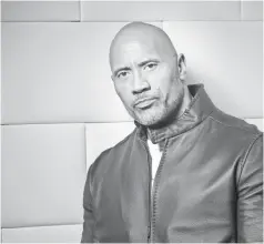  ?? DAN MACMEDAN/ USA TODAY ?? Of his signature smolder, Dwayne Johnson says: “It’s one of those things. God delivered, I signed for it. And it just comes.”