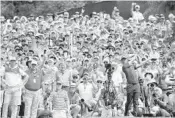  ?? RICHARD HEATHCOTE/GETTY IMAGES ?? Huge galleries followed TigerWoods around the course as he shot a 6-under 64 on Sunday to finish two shot behind PGA Championsh­ip winner Brooks Koepka.