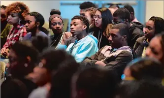  ?? PHOTOS BY SEAN D. ELLIOT/THE DAY ?? High school students who were registered for a bus tour of historical­ly black colleges and universiti­es listen Saturday as three alumni of the tour speak during the Historical­ly Black College Alumni Associatio­n’s 25th anniversar­y event at the Science and Technology Magnet High School in New London. Below, Autumn Marshall, left, and Joaquin Madry, both graduates of Hampton University and alumni of the Historical­ly Black Colleges Alumni’s college tour program, speak about their experience­s.