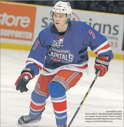  ?? JASON SIMMONDS/TC MEDIA ?? Summerside D. Alex MacDonald Ford Western Capitals forward Austin Taylor in action during a recent MHL (Maritime Junior Hockey League) contest at Eastlink Arena.