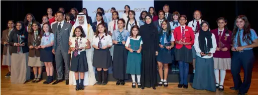  ?? Photo by Leslie Pableo ?? Sheikh Nahyan bin Mubarak Al Nahyan with the winners at the Sheikha Fatima Bint Mubarak Awards for Excellence at Gems Nations Academy, Dubai on Monday. The scholarshi­p will cover a year’s tuition fee of the winners at their respective schools. —