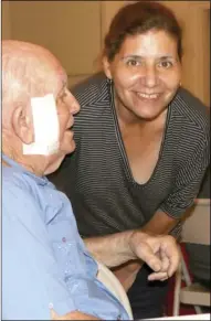  ?? WILLIAM ROLLER PHOTO ?? ABOVE: Marion Journey and Veronica Valencia (right) commune at the American Legion Post 60 in Brawley to celebrate Marion's 86th birthday Wednesday.