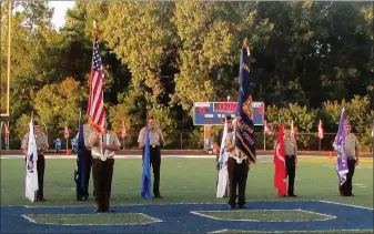  ?? PHOTO COURTESY OF ORTONVILLE VFWPOST 582 ?? Ortonville VFWPost 582present­s the colors during Hero’s Night at a Brandon High School football game. Pictured are Ron Allen (from left), Dennis Hoffman, Don Kengerski, Steven Jurewich, John Wudarcki, Ted Lambiris, Cliff Filhart and Carl Jeffrey.