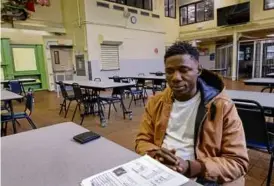  ?? LANE TURNER/GLOBE STAFF ?? Mamadou Diallo has been staying at the Pine Street Inn shelter in Boston since January. He says he migrated from the West African country of Guinea in hopes of a better life in the United States.